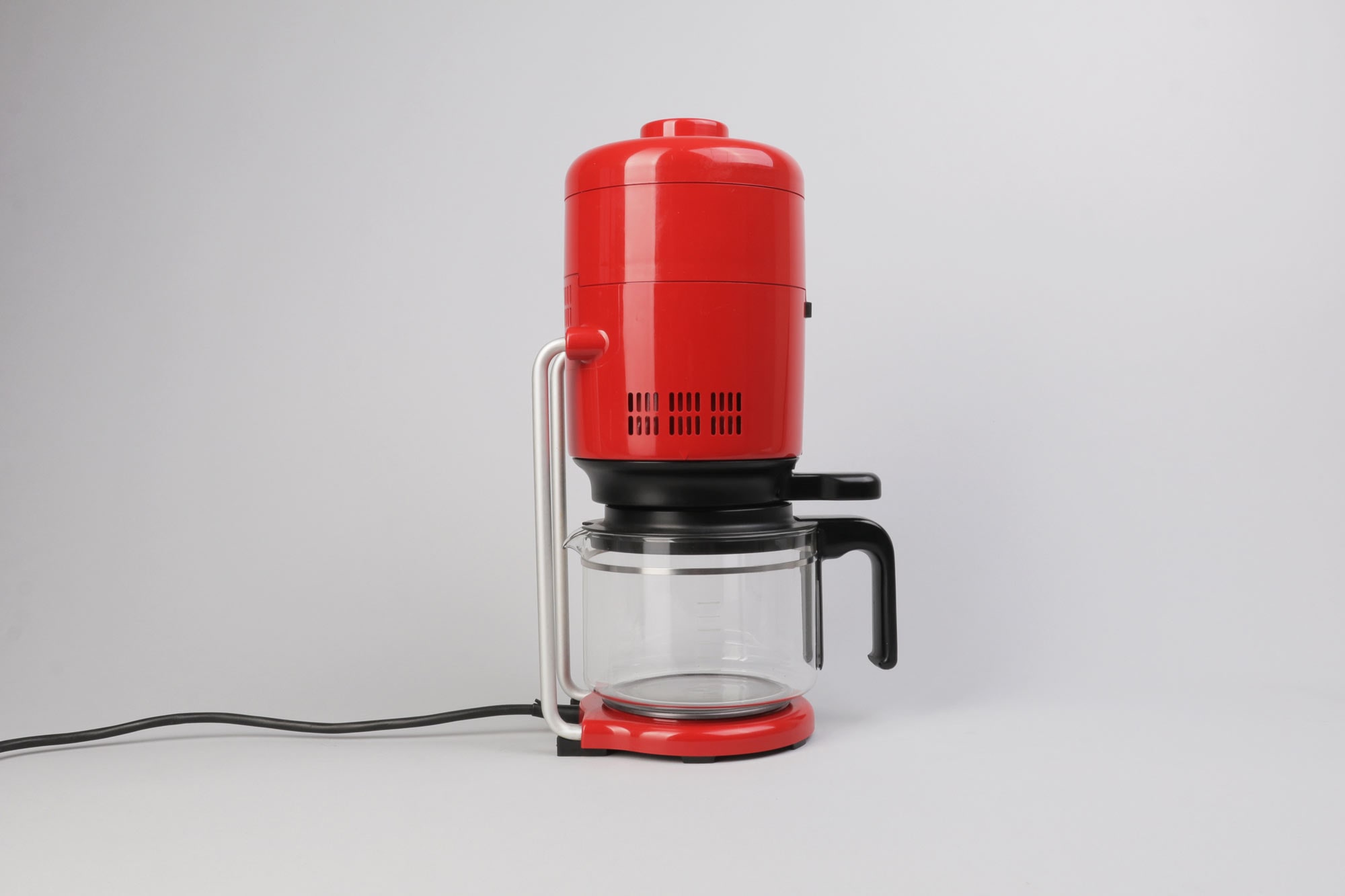 https://onlyonceshop.com/media/pages/product/braun-kf-20/668667f1c3-1650541407/iconic-braun-aromaster-kf-20-kf20-coffee-maker-in-orange-red-designed-by-florian-seiffert-germany-1972-only-once-shop-1.jpg